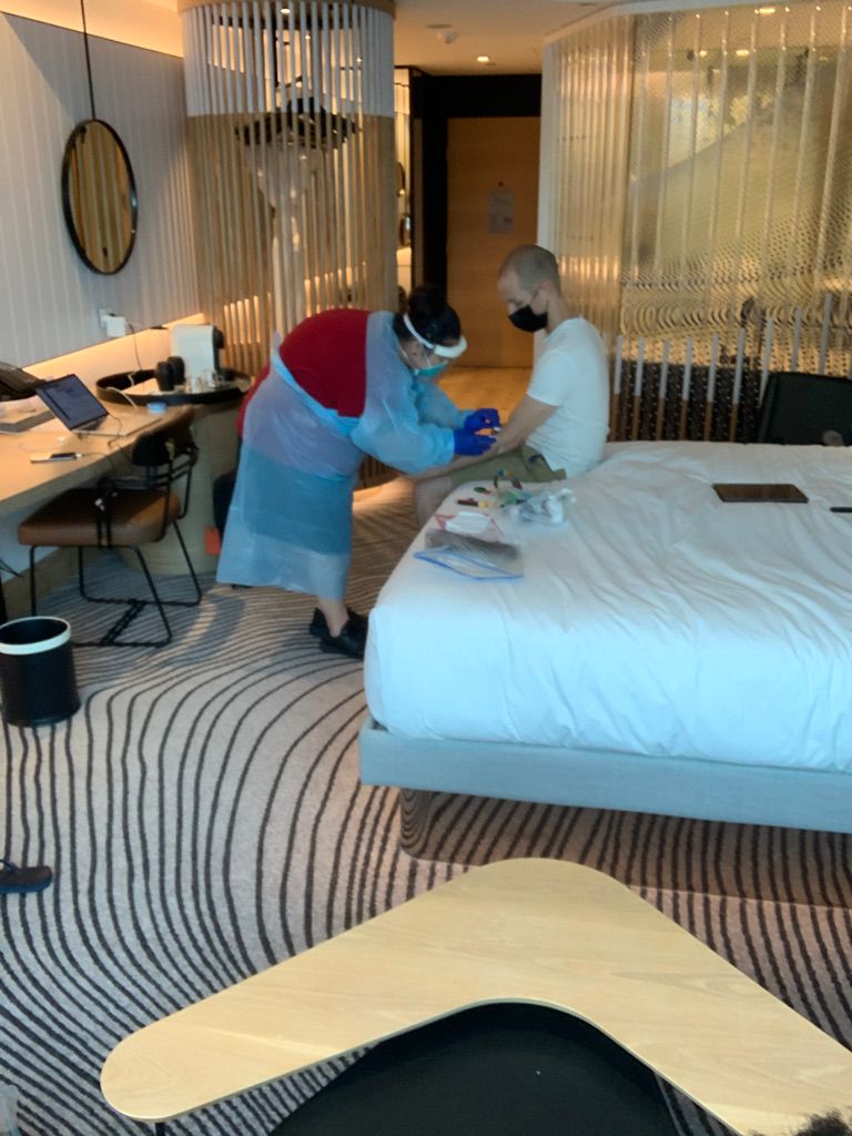 QLD Nurse arriving at the W Hotel to take my blood to ensure I had enough COVID-19 antibodies